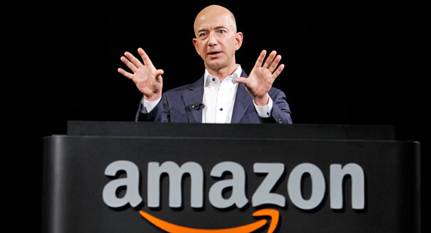Jeff Bezos, CEO and founder of Amazon, at the introduction of the new Amazon Kindle Fire HD and Kindle Paperwhite personal devices, in Santa Monica, Calif., Thursday, Sept. 6, 2012. (AP Photo/Reed Saxon)